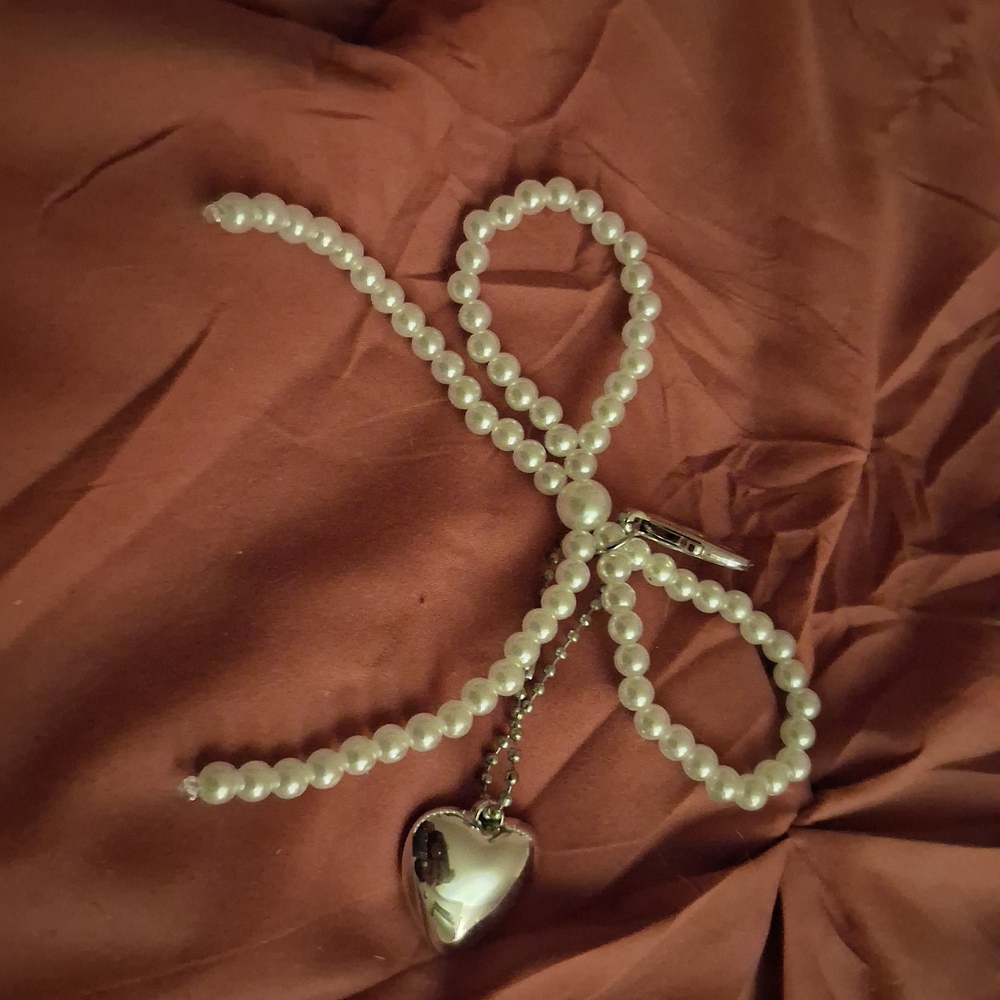 NWOT POMME BAG CHARM